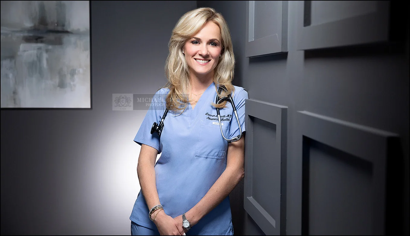Medical professional standing in a modern office during a Houston personal branding photography session.